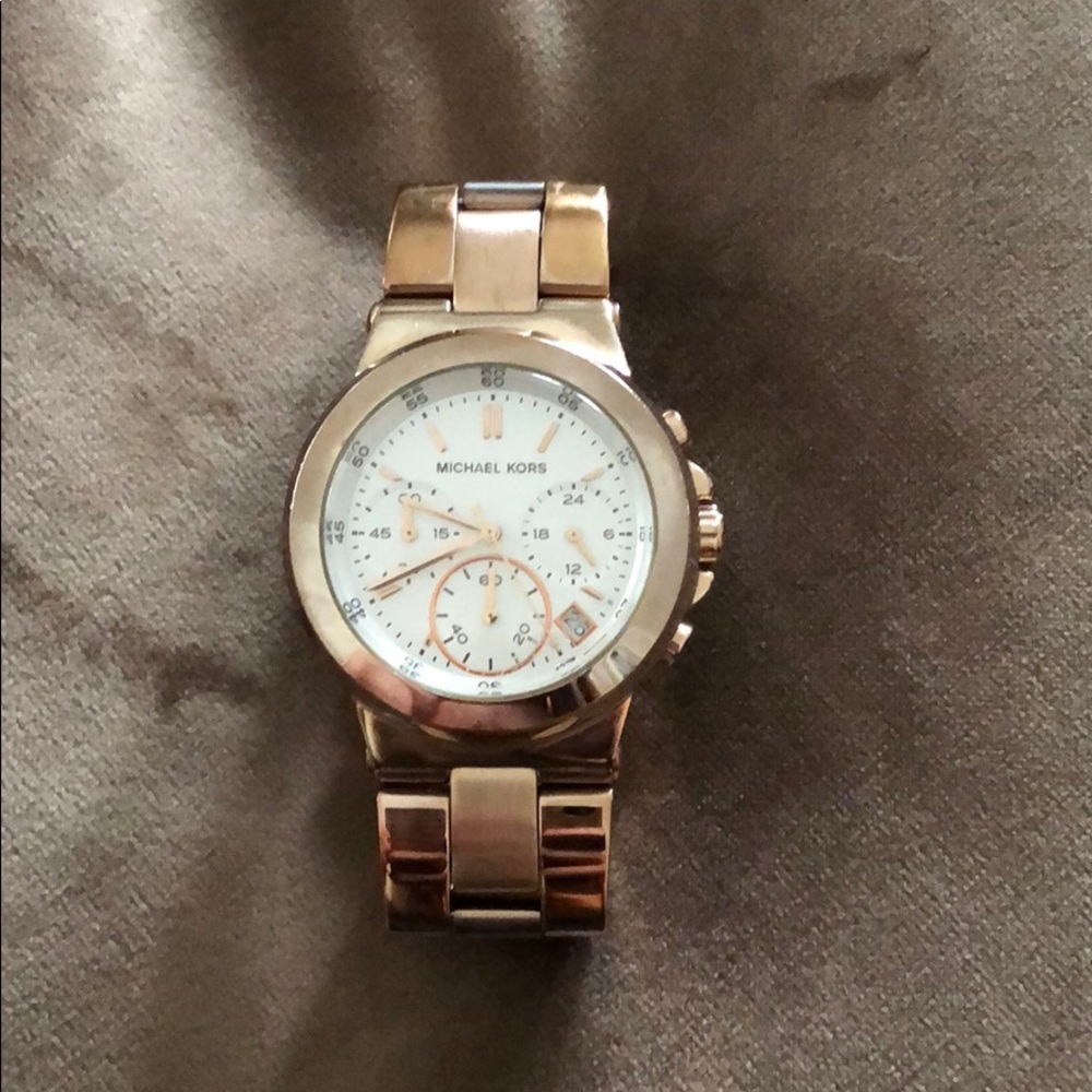 Michael Kors watch comes with links rose gold